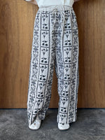 qiri / grow embroidery gather pants (ベージュ黒柄)